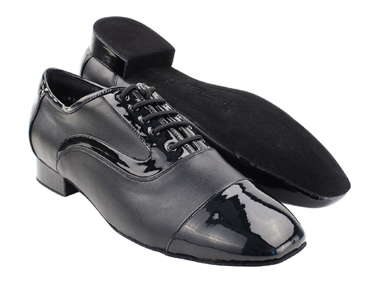 A pair of men's ballroom dance shoes with a toe cap